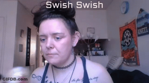 Woman With Tattoo Saying Swish Swish GIF