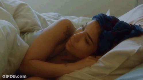 Woman With Tattoo Sleeping GIF