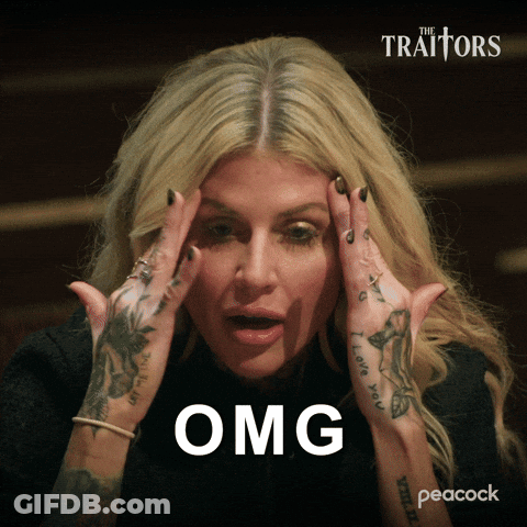 Woman With Tattooed Hands Holding Head Saying Omg GIF