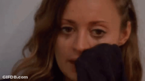 Woman With Tear Covering Face GIF