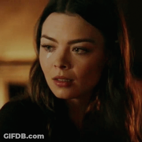Woman With Tear Running Down Cheek GIF