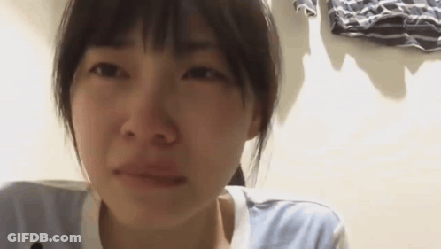 Woman With Tear Running Down Her Cheek GIF