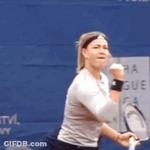 Woman With Tennis Racquet At Blue Wall Saying Montreal Group GIF