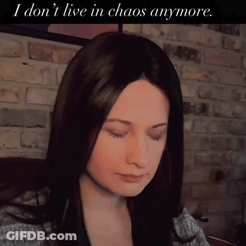 Woman With Text I Don't Live In Chaos Anymore GIF