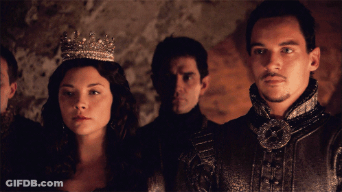 Woman With Tiara Next To Man GIF