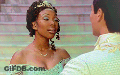 Woman With Tiara Next To Man In Suit GIF