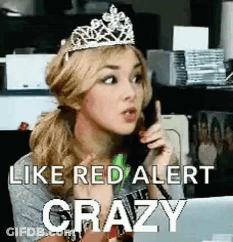 Woman With Tiara Sitting At Laptop GIF