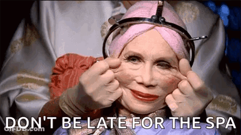 Woman With Towel And Crown Making Funny Face GIF