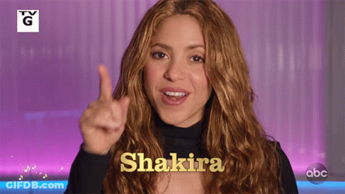 Woman With TV G Logo And Shakira GIF