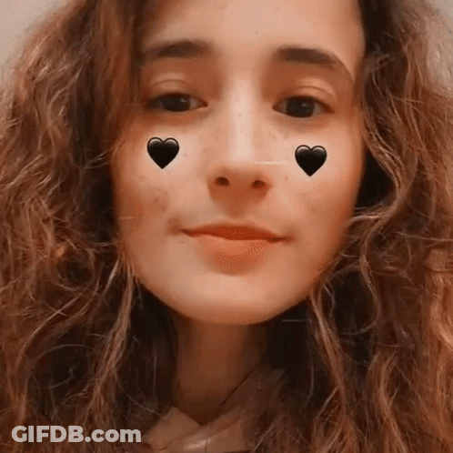 Woman With Two Black Hearts GIF