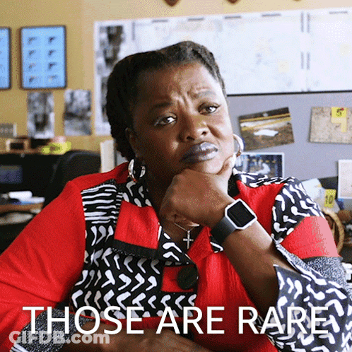 Woman With Watch By Sign Those Are Rare GIF
