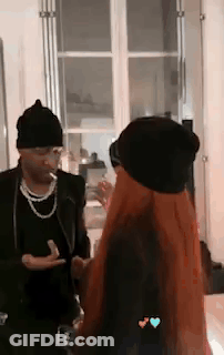 Woman With Watch Shakes Hands With Man GIF