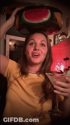 Woman With Watermelon Head Holding Martini GIF