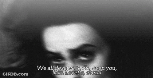 Woman With We All Deserve To Die Text GIF