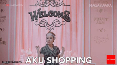 Woman With Welcome Aku Shopping Sign GIF