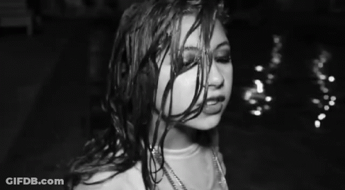 Woman With Wet Hair And Necklace GIF