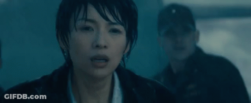 Woman With Wet Hair Looking At Camera GIF