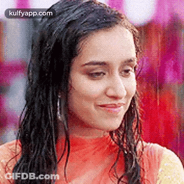 Woman With Wet Hair Smiling In Rain GIF