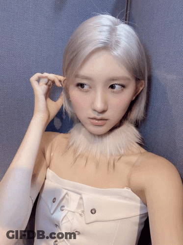 Woman With White Hair And Fur Collar GIF