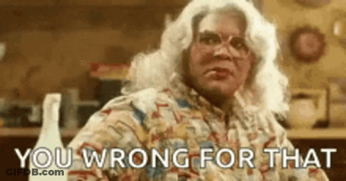 Woman With White Hair And Glasses Sitting GIF