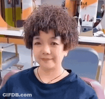 Woman With Wig At Hair Salon GIF