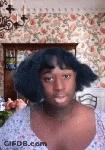 Woman With Wig Making Funny Face GIF