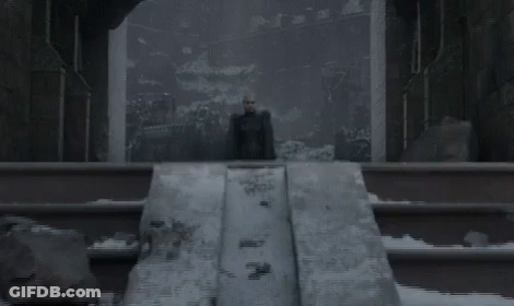 Woman With Wings Standing On Ledge In Dark Room GIF