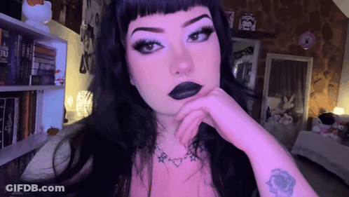Woman With Wrist Tattoo Saying I Love You GIF