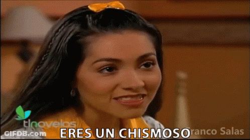 Woman With Yellow Bow Saying Eres Un Chismosoro GIF