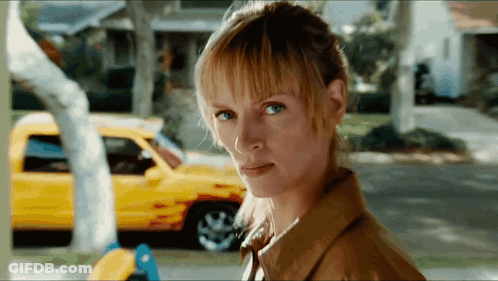 Woman With Yellow Car Behind GIF