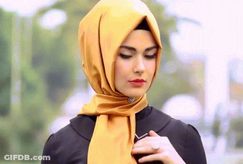 Woman With Yellow Scarf And Ring GIF
