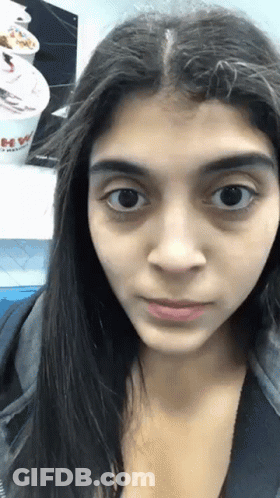 Woman With Yogurt Cup Saying Yogurt GIF