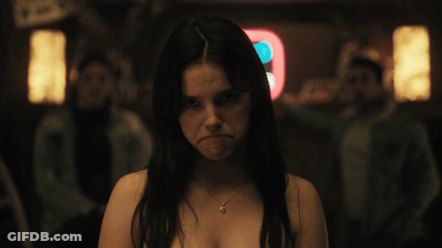 Woman Without Shirt By Neon Sign 8 GIF