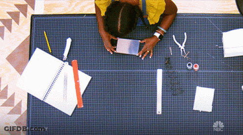 Woman Working On Cutting Mat With NBC Written GIF
