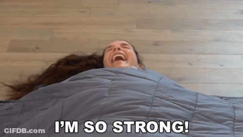 Woman Wrapped In Blanket Saying I'm So Strong GIF
