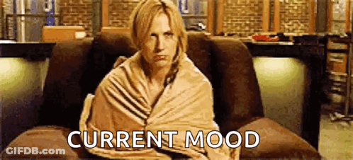 Woman Wrapped In Blanket Sitting On Couch Current Mood GIF