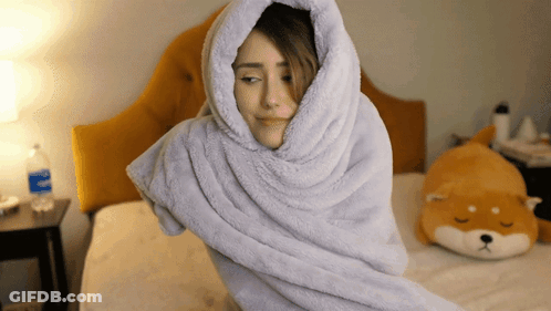 Woman Wrapped In Blanket With Aquafina Water GIF