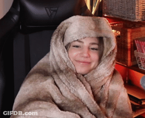 Woman Wrapped In Blanket With Hood GIF