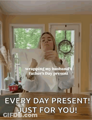 Woman Wrapping Father's Day Present For Husband GIF