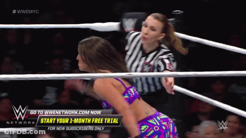Woman Wrestling Ring With Go To Wnetwork.com Now GIF