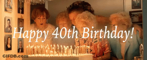 Women Celebrating 40Th Birthday With Cake And Candles GIF