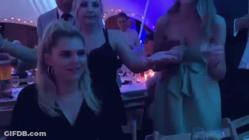Women Dancing At Party In Tent GIF