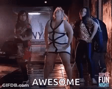 Women Dancing In Dark Alleyway One In White Dress GIF