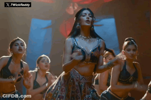 Women Dancing In Front Of 7Wickreddy Sign GIF
