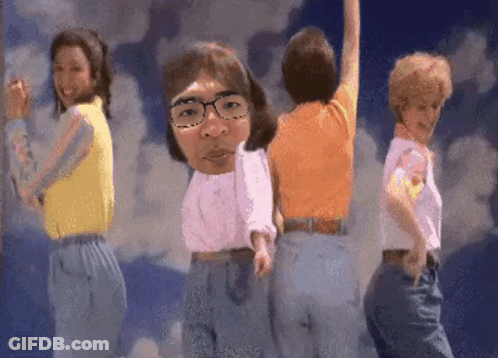 Women Dancing In Front Of Blue Sky With Man With Glasses On Head GIF