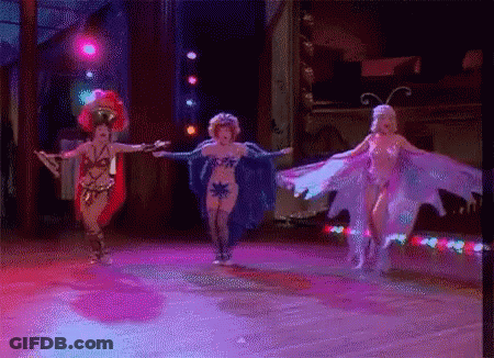 Women Dancing On Stage In Costume GIF