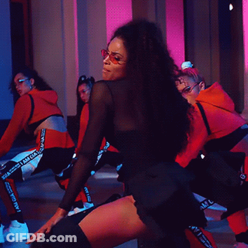 Women Dancing On Stage One In Black Dress GIF