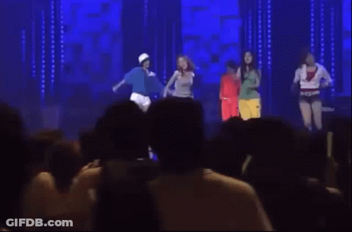 Women Dancing On Stage With Crowd Watching GIF
