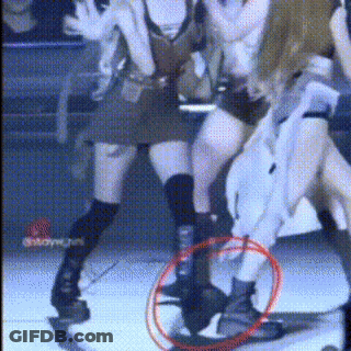 Women Dancing On Stage With Red Circle Around Feet GIF