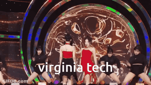 Women Dancing On Stage With Virginia Tech Text GIF